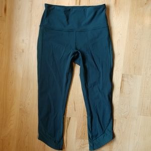 Lululemon Capris with Mesh Sides and Curved Hem